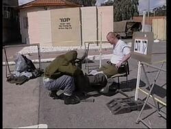 Israeli gas mask distribution for immigrant workers, children/ gas attack simulation News Clip