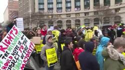 CLEAN : Protesters gather along inauguration parade route News Clip