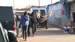 CLEAN : France Calais migrants move camp away from main road News Clip