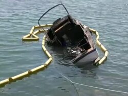 Sinking Boat, Debris Zoom In Stock Footage