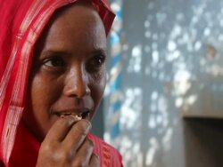 Woman eating popcorn during coffee ceremony Stock Footage