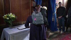 CLEAN : People sign book of condolences in Cambridge after Hawking death News Clip