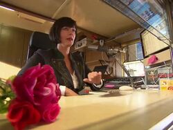 woman sitting on the check in Stock Footage