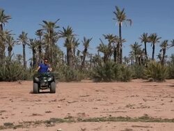 Good Looking Young Couple ride Quad Bike Stock Footage