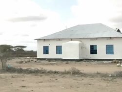 Riding through destroyed houses Stock Footage