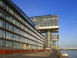 WS LA Shot of Modern buildings at Rheinau Halbinsel with Rhine river / Cologne, North Rhine Westphalia, Germany Stock Footage