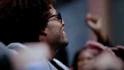 Hip-hop star connects with fans and soaks up applause outside awards show at awards show Stock Footage