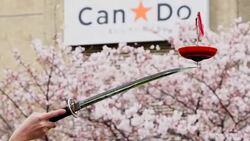 Heaven Artist Kotaro, who is showing Japanese Traditional Performance Dokuraku Hawatari at Iidabashi Station in Chiyodaku-ku Tokyo. Stock Footage