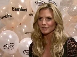 INTERVIEW - Heidi Klum talks about her collection for the kids. Heidi Klum Presents Her Holiday Truly Scrumptious Collection For Babies"R"Us At Kids Fashion Week In NYC Stock Footage