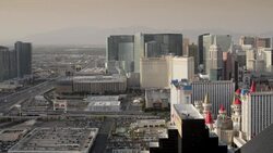 Heavy traffic moves on an interstate running parallel to Las Vegas Boulevard near several mega casinos. Stock Footage