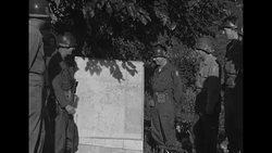 US Army officers of 25th Infantry Division looking at map during the 1950's News Clip