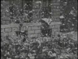 Pilot Charles Lindbergh rides through New York City in a huge celebratory parade. News Clip