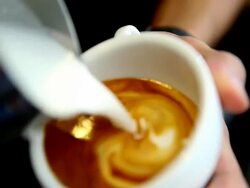 HD:Latte art,Milk pouring by a Barista. Stock Footage