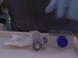 A city worker takes water samples and records data. Stock Footage