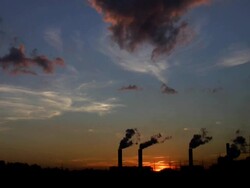 Power plant at sunset Stock Footage