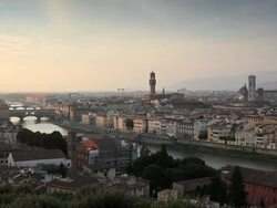 Magnificent elevated city view of Florence the Ponte Vecchio Bridge, Arno River and Duomo Cathedral, Florence, Italy Stock Footage