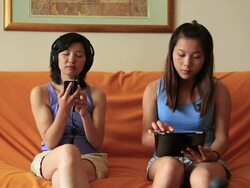 Young women listening music in the room together Stock Footage