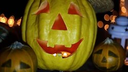 Halloween pumpkin head jack lantern on wooden background Stock Footage