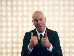 Man in front of lightwall Stock Footage