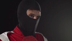 Motor racing / Formula One Driver getting dressed Montage Stock Footage