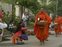ZI Monks collecting alms / Luang Prabang, Laos Stock Footage