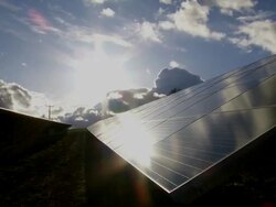 HD Solar Park in Front of Dramatic Sky Time Lapse Stock Footage