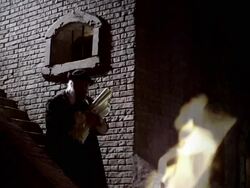 A man approaches a fire with pages of writings by Nostradamus in a reenactment. Stock Footage