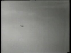 B/W piece of exploded airplane falling to ground /air show / England / SOUND Stock Footage