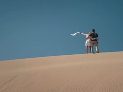 Couple in desert Stock Footage
