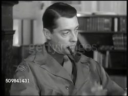 1945: U.S. RED CROSS: EXT US soldiers standing by entrance. LA US Flag, building 'American Red Cross.' DRAMATIZATION: Red Cross men & women talking '... what do the British want?' 'They feel we refuse to understand their position.' Instructional Video