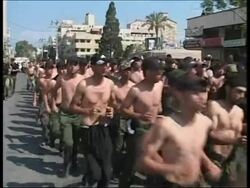 Thousands of Palestinian forces loyal to Abbas parade nearHamas security unit News Clip