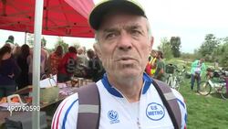 VOICED : France activists on wheels raise awareness about climate change News Clip