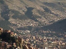 Overview of La Paz [Nuestra SeÃƒÂ±ora de La Paz/Chuquiago Marka/Chuqiyapu] with busy roads, Bolivia Stock Footage