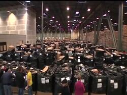 Internet retailer Overstock.com auctions overstocked goods by pallet at Salt Lake City warehouse. News Clip