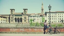 Hipster guy with bicycle in Florence, Italy Stock Footage