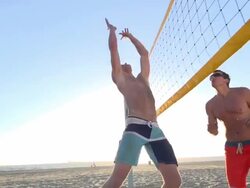Men playing beach volleyball. Stock Footage