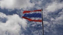 Thailand flag against a blue sky. Part 4 Stock Footage