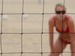  CU R/F Women playing beach volleyball through net / Redondo Beach, California, United States Stock Footage