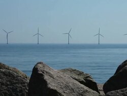 Windmills off shore Stock Footage