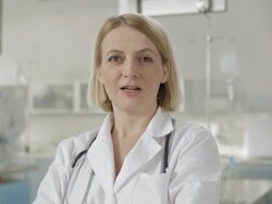 Female Doctor Talking At The Camera Stock Footage