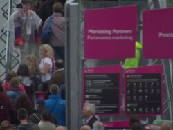 Crowds Walking into the Olympic Park News Clip