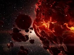 Asteroid field hovering near dead planet in outer space Stock Footage