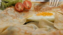 eating spinach pie with sauce close up Stock Footage
