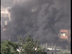 WRAP Heavy fighting continues in refugee camp, shelling; ADDS more shots News Clip