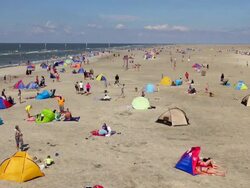WS View of crowd of people at beach, North Sea North Frisia, / St. Peter Ording, Schleswig Holstein, Germany Stock Footage