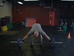 Medium shot. Dustin performs "snatch;" camera tracks around as he performs a second snatch. Stock Footage