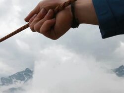 PAN from mountaineer to team mate on Tyrolean traverse Stock Footage