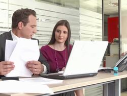 HD DOLLY: Disabled Businessman Discussing Paperwork Stock Footage