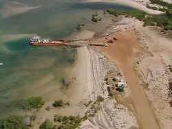 AERIAL WS DS View of Barge Docked in Darwin / Darwin, Northern Territory, Australia Stock Footage