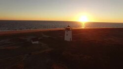 Flyover Lighthouse at Sunset Stock Footage
